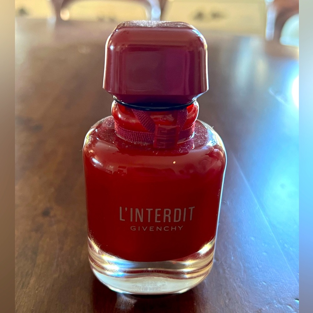 50mL bottle used about 3x. Perfume bottle is opaque but it’s completely full.